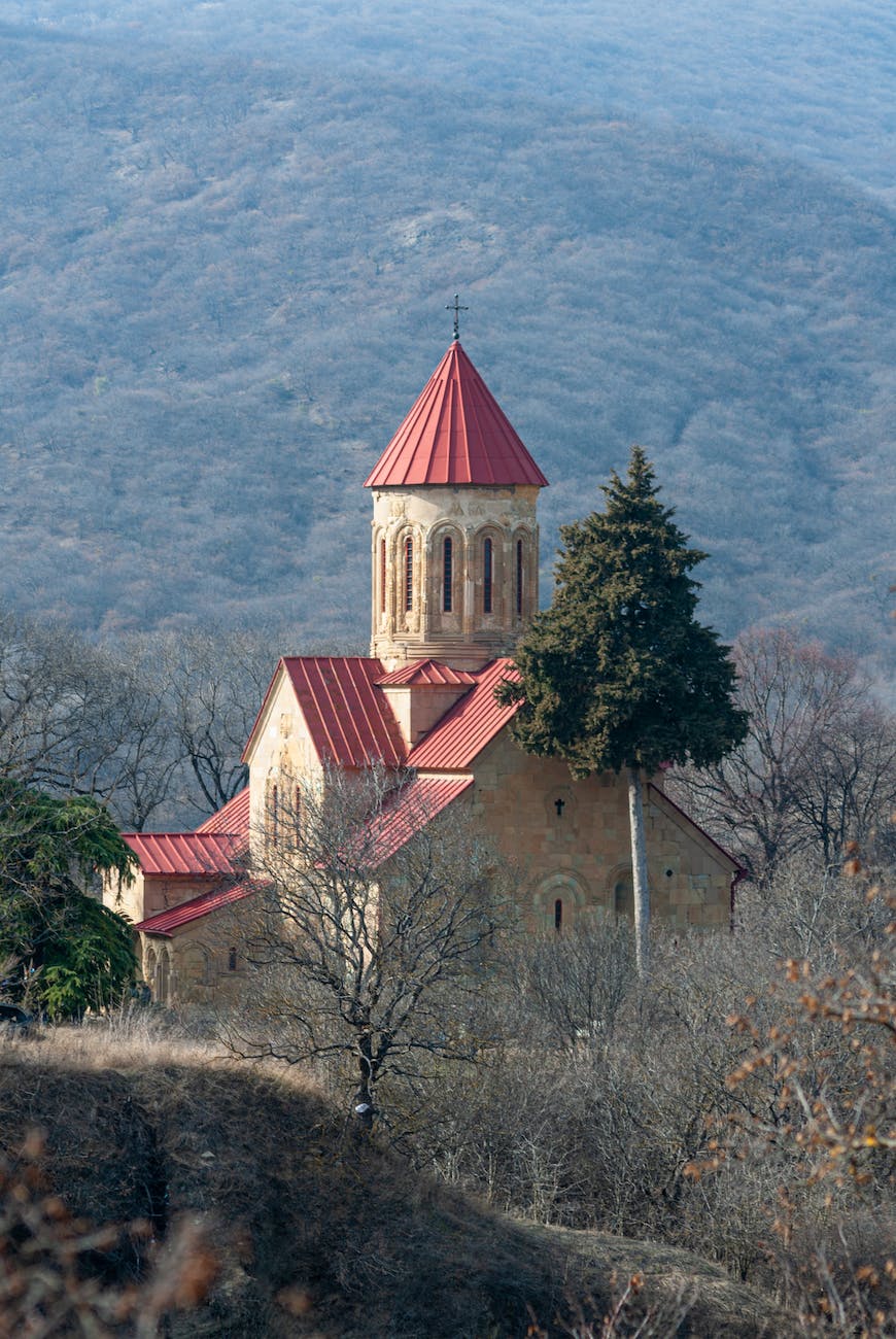 a concrete church on the field