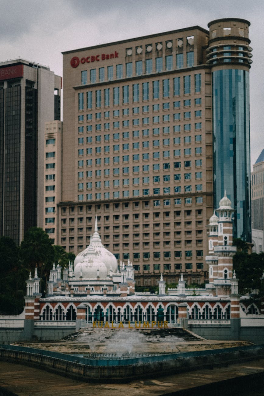 the jamek mosque near the ocbc bank building in malaysia