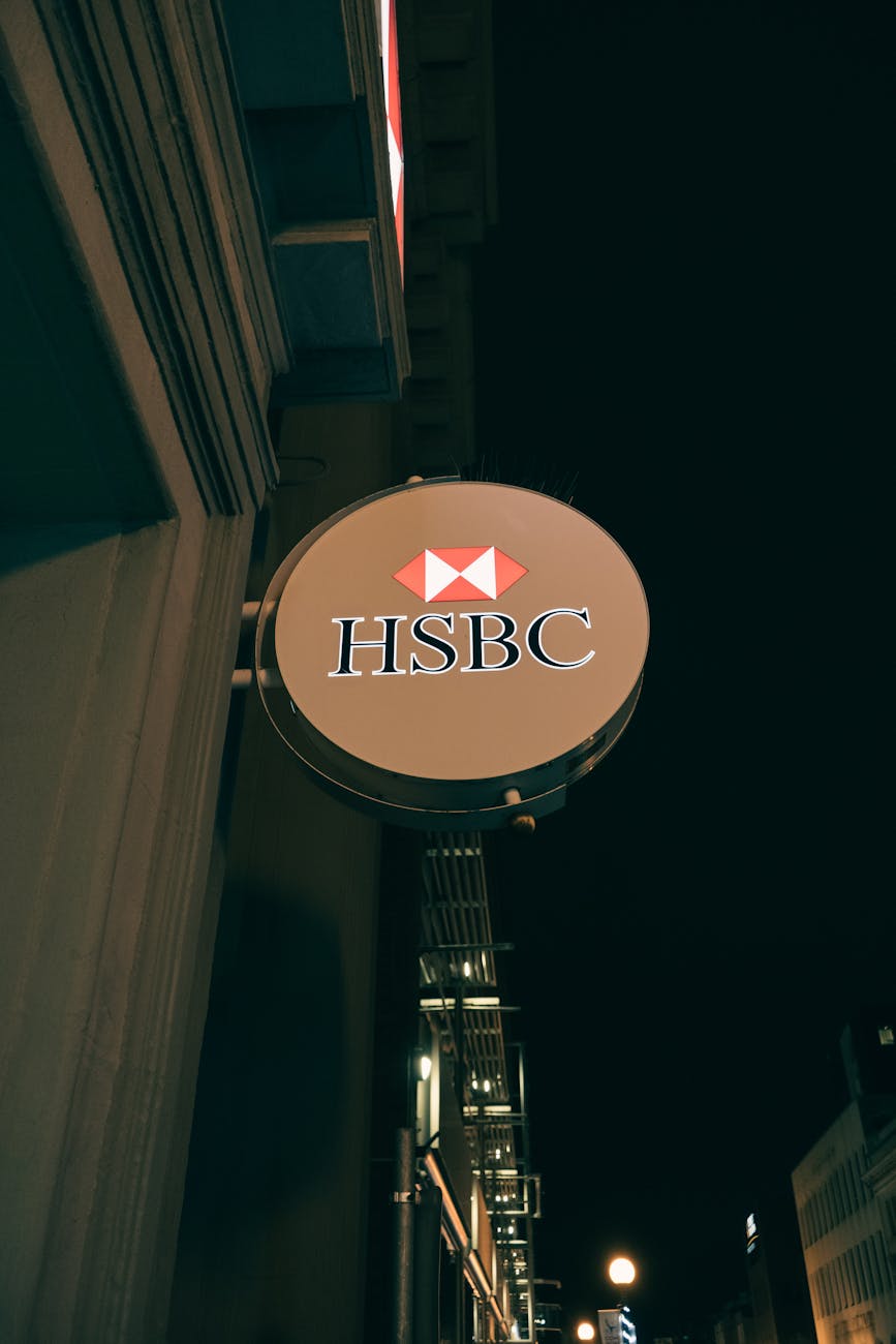 signage of a building under night sky